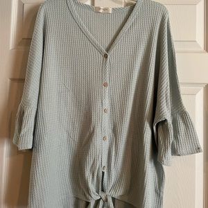 Button up blouse with tie at bottom